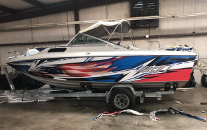 boat-with-vinyl-wrap-installed-with-red-white-and-blue-lightning-graphics