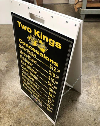 black-menu-board-with-white-lettering-for sign-of-concession-stand